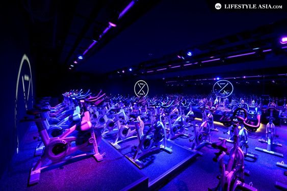 dark gym with bright multicolored led lights