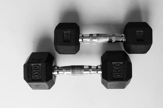 two rubber hex dumbbells