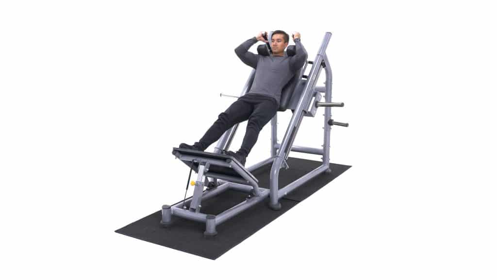 How To Use Hack Squat Machine (Exercise Guide & Tips)