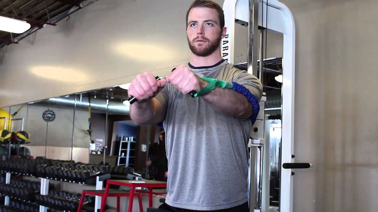 Man Doing Resistance Band Crossover Exercise