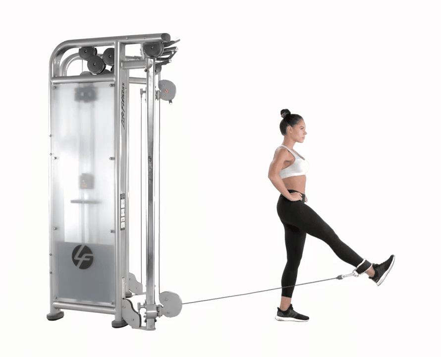woman doing glute exercise on able machine