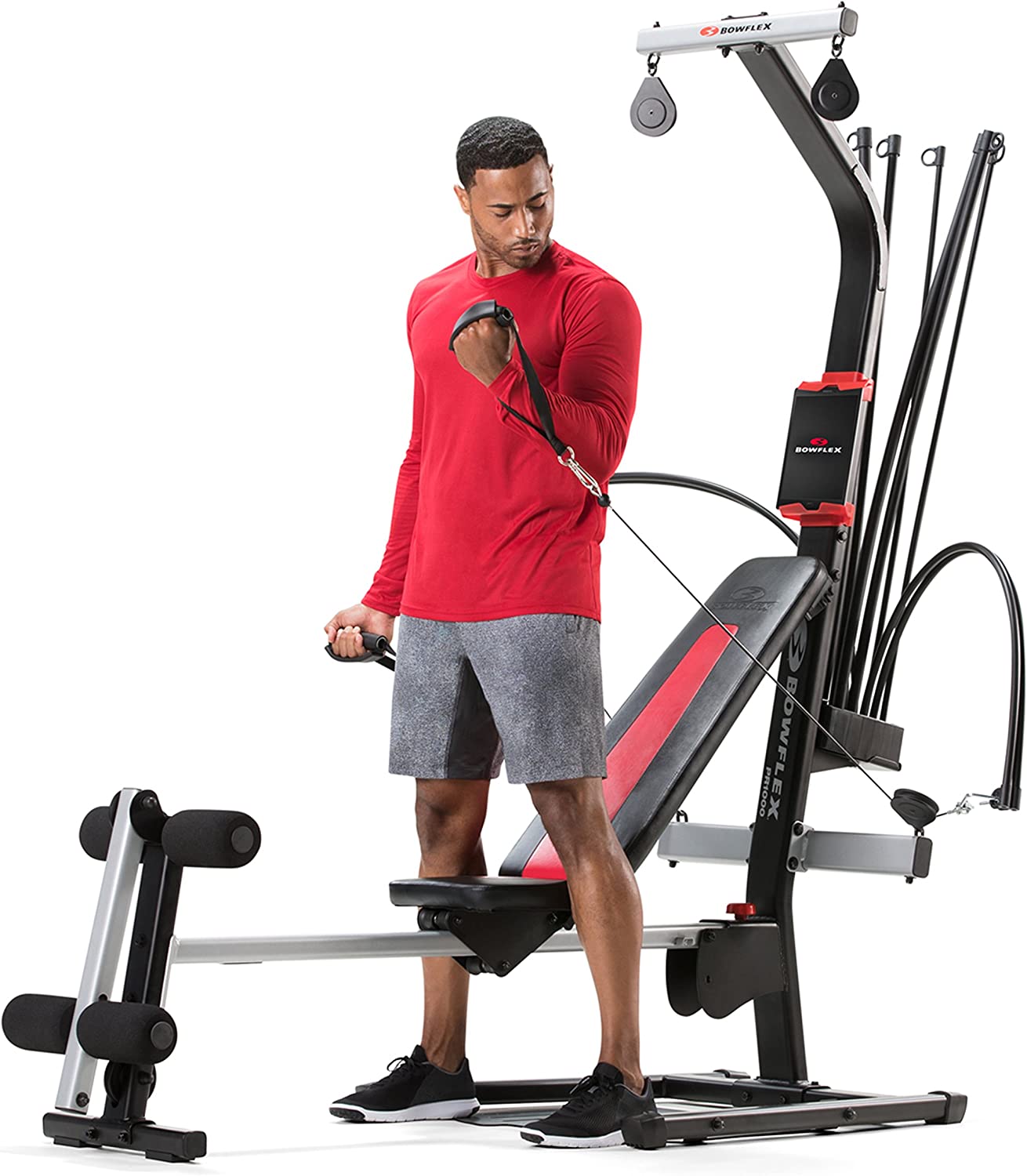 Man doing bicep exercise with Bowflex PR1000 Home Gym