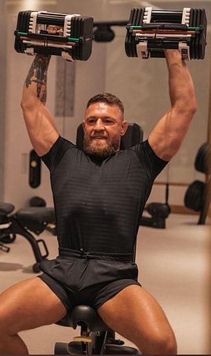 Conor Mcgregor Doing Overhead Presses at Home