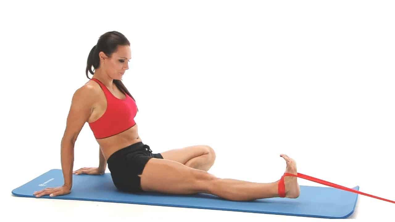 woman doing Resisted Dorsiflexion With Band exercise