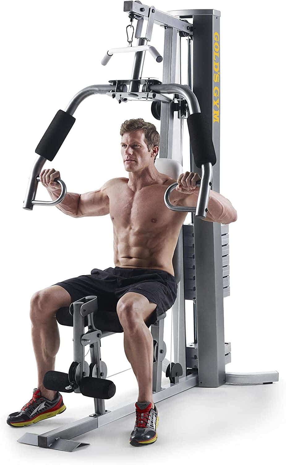 Man in Black Shorts Using Chest Press Arms on Gold's Gym XRS 50