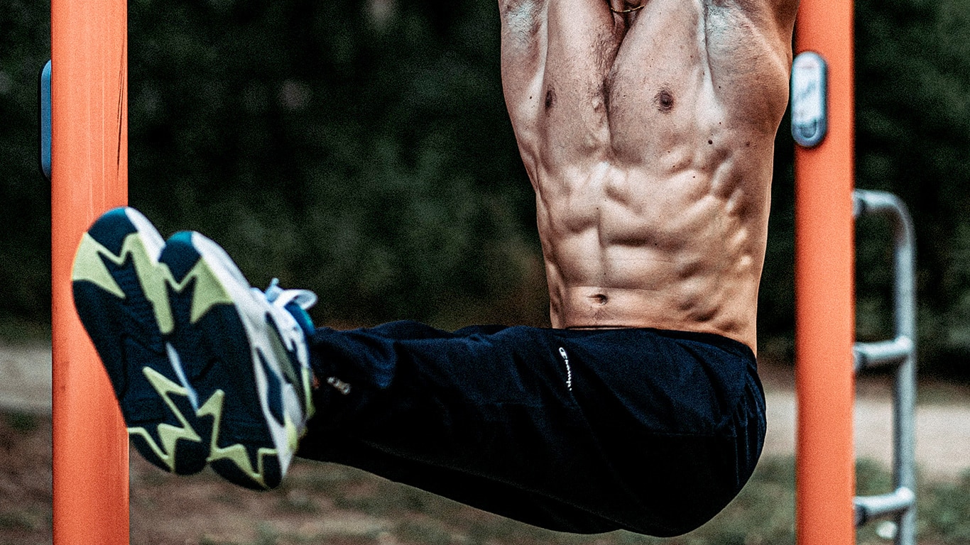 Man Doing Ab Workout Routine Outdoors